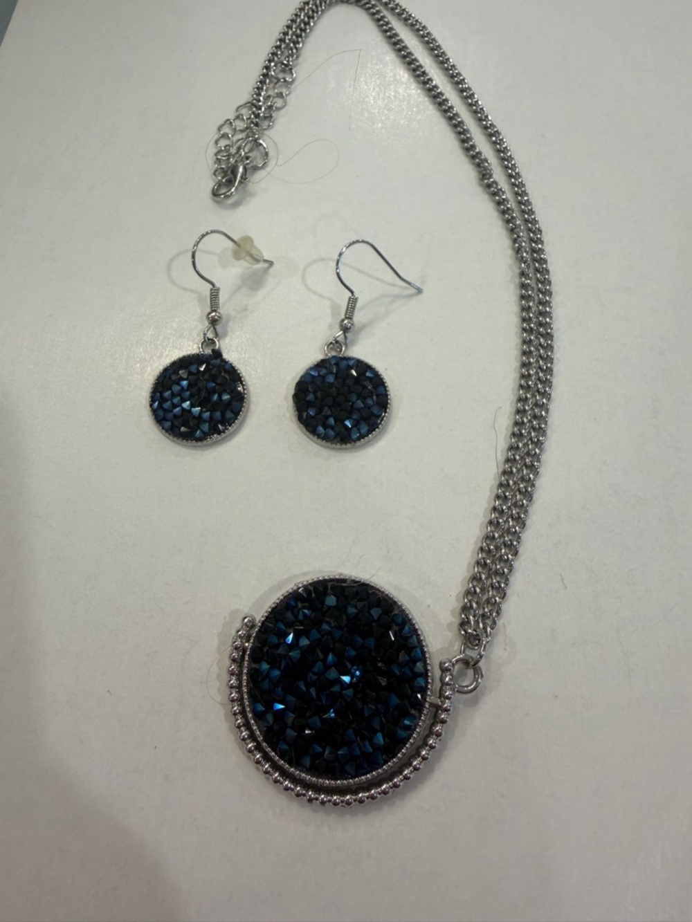 Silver Necklace and Earring Set with Dark Blue Crystal Discs